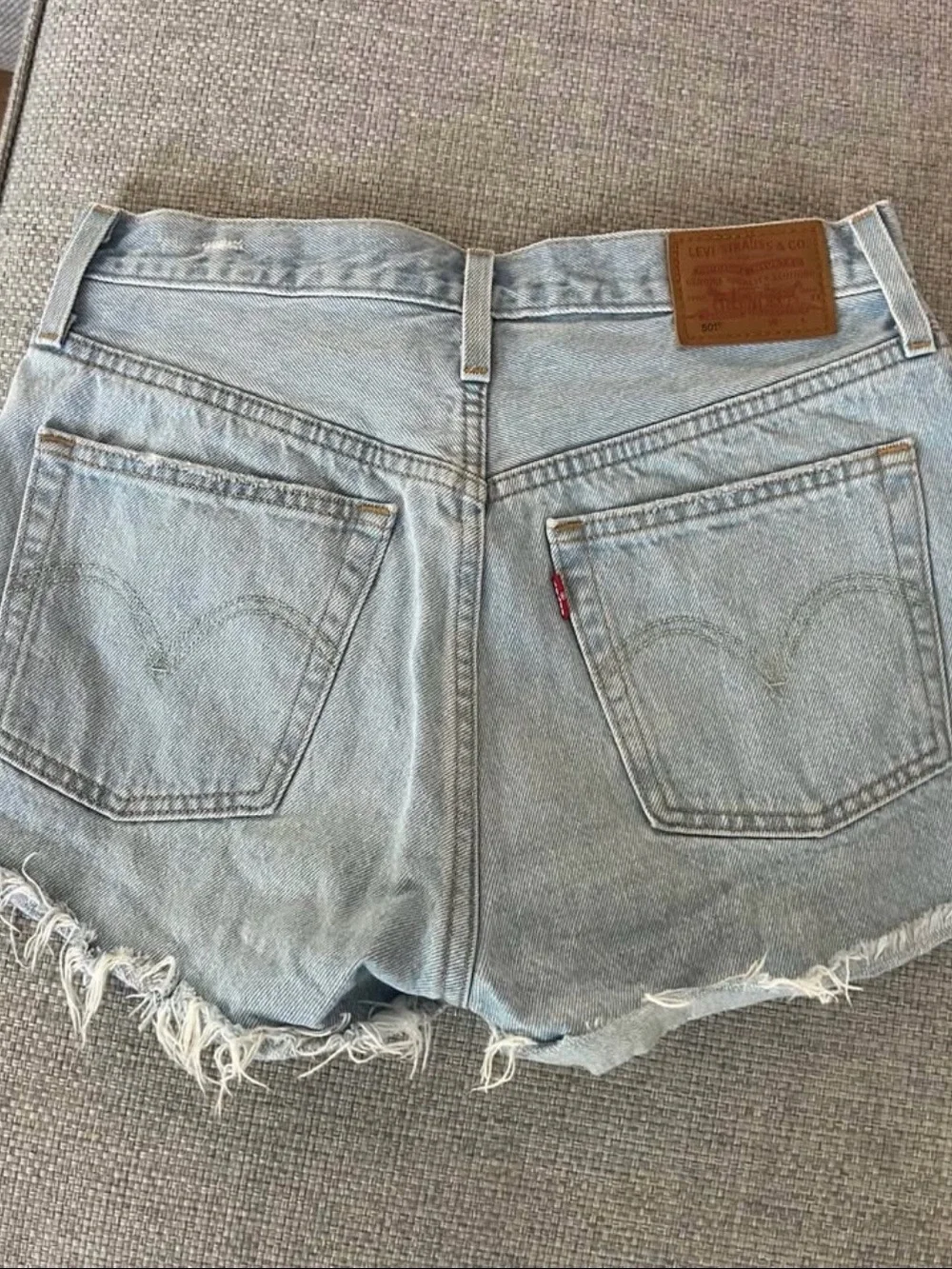 Levi's Light Blue Distressed Denim Shorts